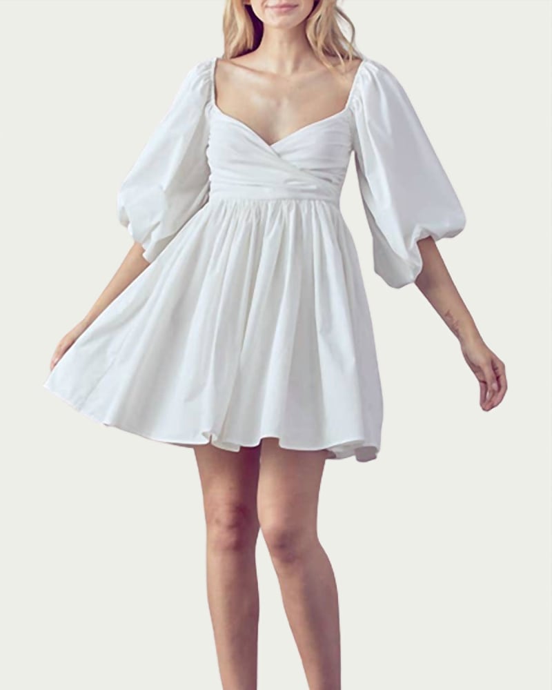 Front of a model wearing a size L Shirred Wrap-Effect Cotton Mini Dress in White in White by Fore. | dia_product_style_image_id:339449